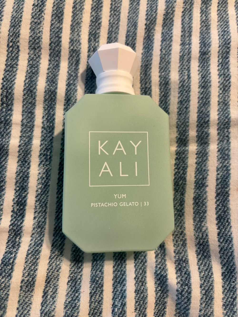 KAYALI 
YUM PISTACHIO GELATO | 33 1.7 fl oz